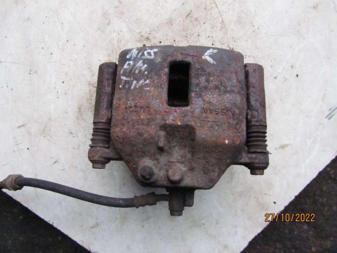 суппорт передний левый Nissan Almera Tino V10 2002 - фото №1