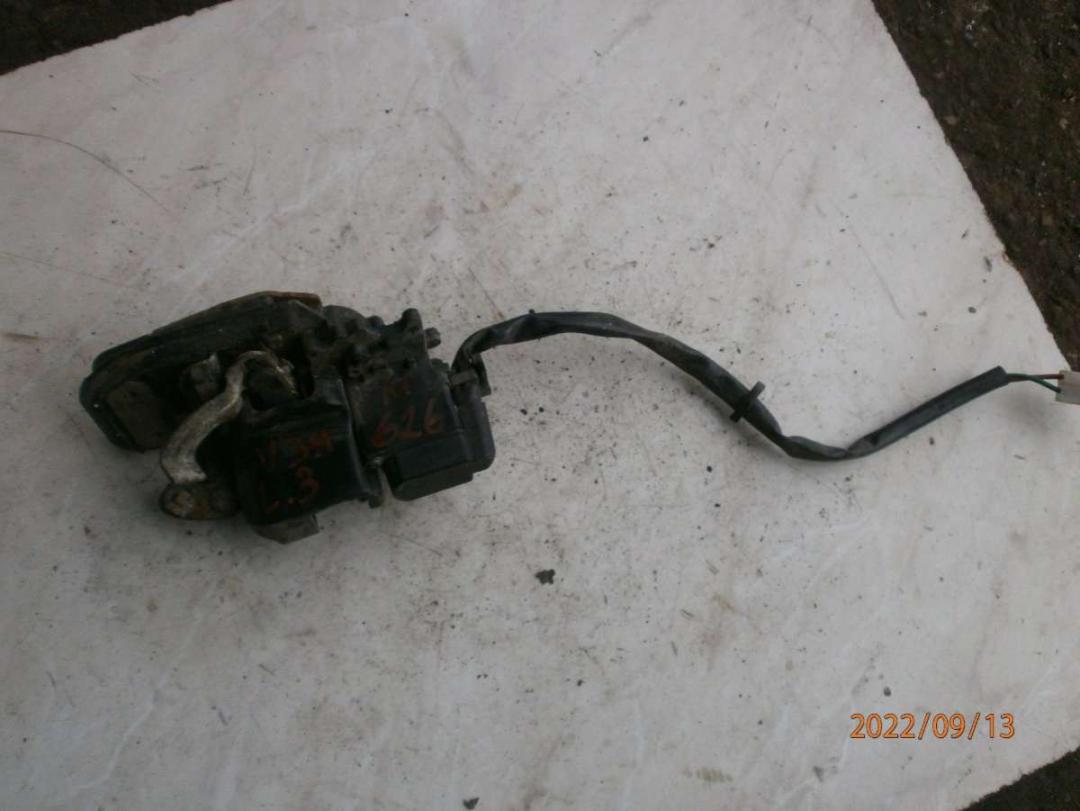 замок двери задней левой Mazda 626 GE 1996, 2.0 л., TD, дизель, МКПП, седан - фото №1