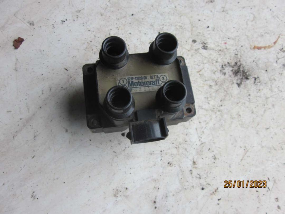 катушка зажигания Ford Escort 5 поколение 1992, 1.4 л., бензин, МКПП, хетчбэк 5 дв., 928F12029CA - фото №1