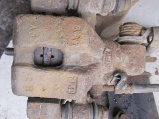 суппорт задний правый Kia Clarus 1 поколение 1997, 1.8 л., бензин, МКПП, седан