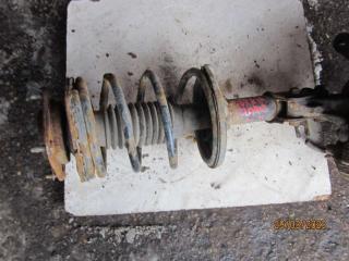 стойка передняя левая Kia Clarus 1 поколение 1997, 1.8 л., бензин, МКПП, седан