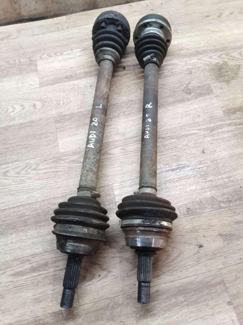 полуось передняя левая (приводной вал, ШРУС) Audi 80 B3 1988, 1.8 л., бензин, МКПП, седан - фото №1