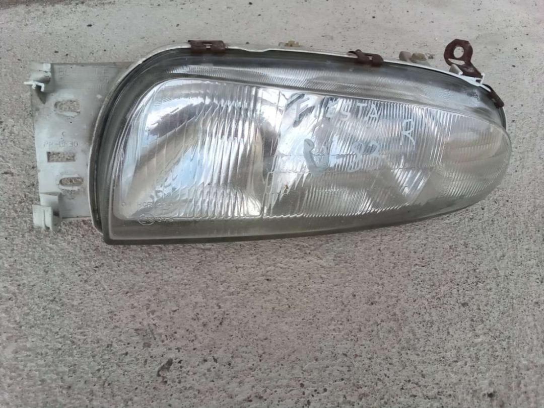 фара левая Ford Fiesta 4 поколение 1998, 1.3 л., бензин, МКПП, хетчбэк 5 дв. - фото №1