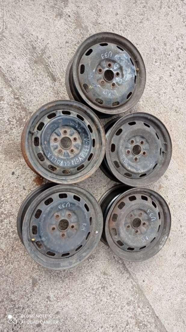 диск штампованный Toyota Carina T190 1996, 1.6 л., бензин, МКПП, седан - фото №1