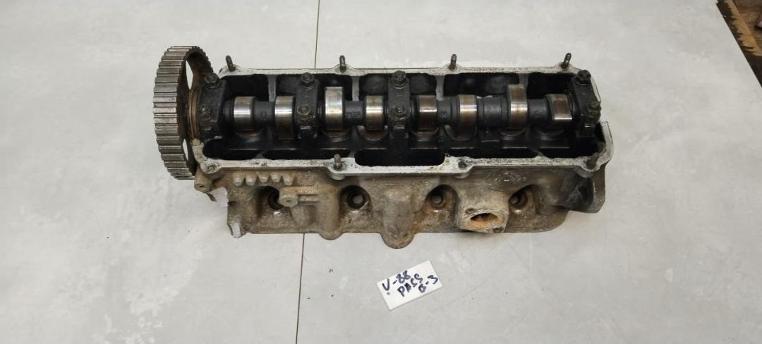 головка блока цилиндров Volkswagen Passat B3 1990, 1.8 л., бензин, МКПП, седан - фото №1