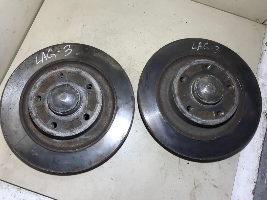 диск тормозной задний Renault Laguna 3 поколение 2011, 1.5 л., дизель, МКПП, хетчбэк 5 дв. - фото №1