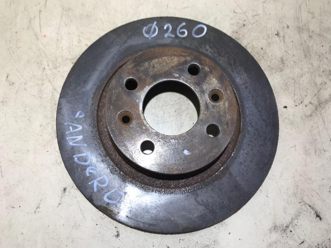 диск тормозной передний Dacia Sandero 1 поколение 2010, 1.4 л., бензин, МКПП, хетчбэк 5 дв. - фото №1