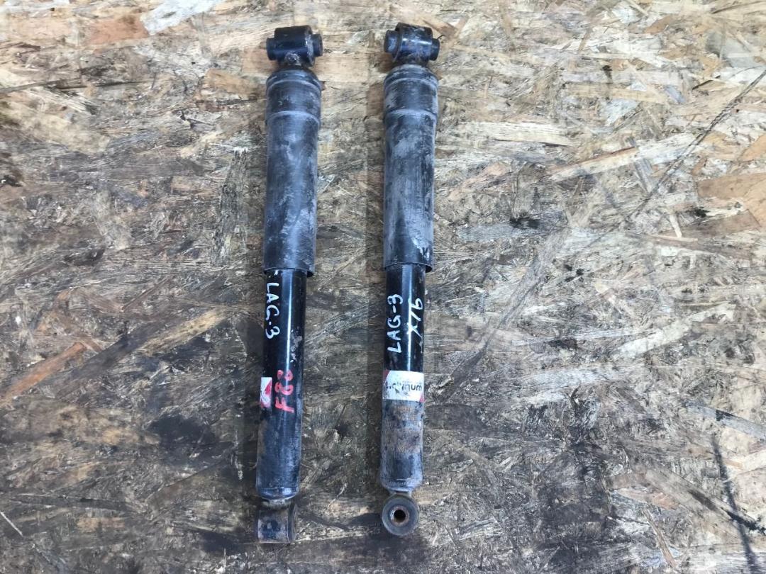 амортизатор задний Renault Laguna 3 поколение 2010, 1.5 л., дизель, МКПП, хетчбэк 5 дв. - фото №1