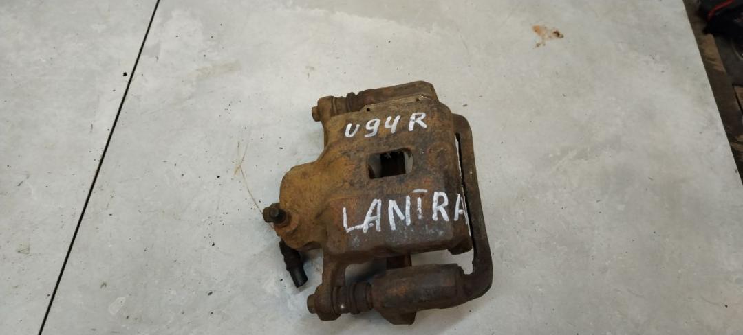 суппорт передний правый Hyundai Lantra J2 1997, 1.6 л., бензин, МКПП, седан - фото №1