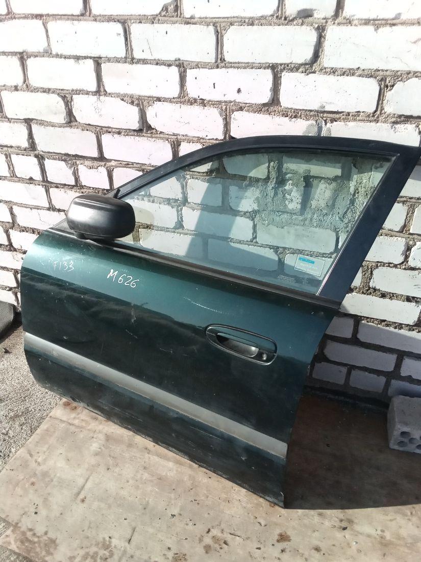 дверь передняя левая Mazda 626 GF 1998, 2.0 л., бензин, хетчбэк 5 дв. - фото №1