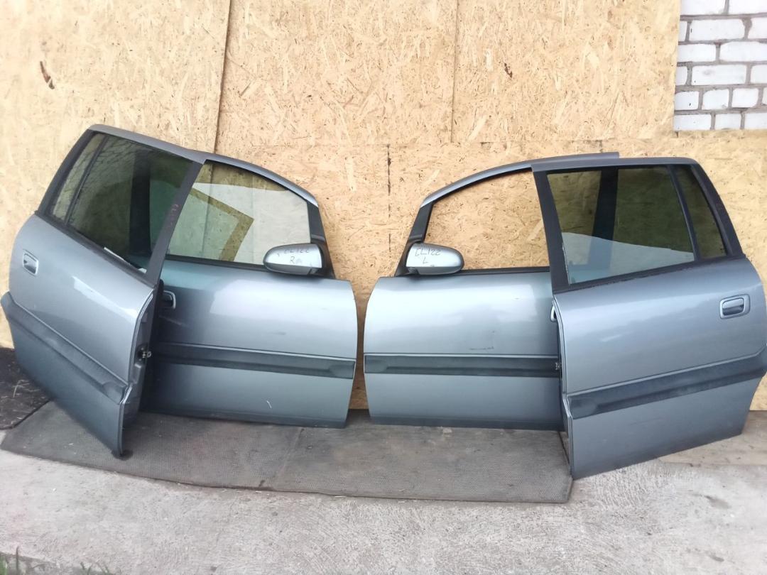 дверь передняя левая Opel Zafira 1 поколение (A) 2002, 1.8 л., бензин, АКПП, минивэн - фото №1