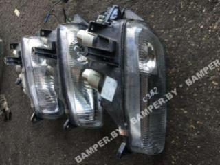 фара левая Mazda 323 BA 1995