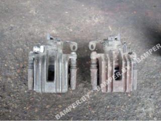 суппорт задний левый Volkswagen Golf 4 поколение 2001