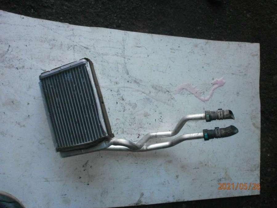 радиатор отопителя (печки) Ford Fusion 1 поколение 2004, 1.4 л., i, бензин, МКПП, хетчбэк 5 дв. - фото №1