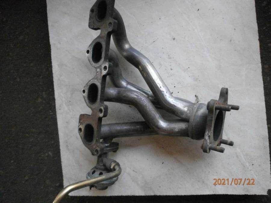 коллектор выпускной Volkswagen Golf 4 поколение 2000, 1.4 л., бензин, МКПП, универсал - фото №1