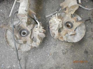 кулак поворотный левый Mitsubishi Carisma 1 поколение 1996, 1.8 л., бензин, АКПП