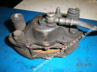 суппорт передний левый Mazda 323 BG 1992