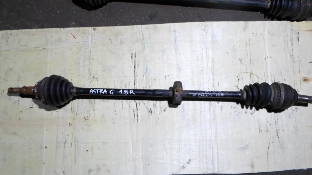 полуось передняя правая (приводной вал, ШРУС) Opel Astra G 2000, 1.8 л., бензин - фото №1