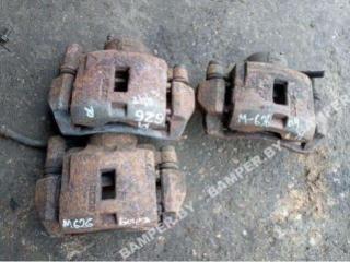 суппорт передний левый Mazda 626 GE 1995