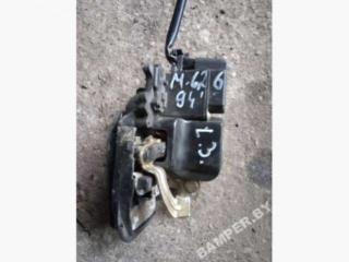 замок двери задней левой Mazda 626 GE 1996