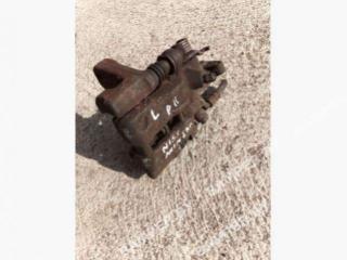 суппорт задний левый Nissan Primera P11 [рестайлинг] 2000