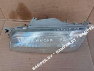 фара левая Mitsubishi Lancer 7 1993