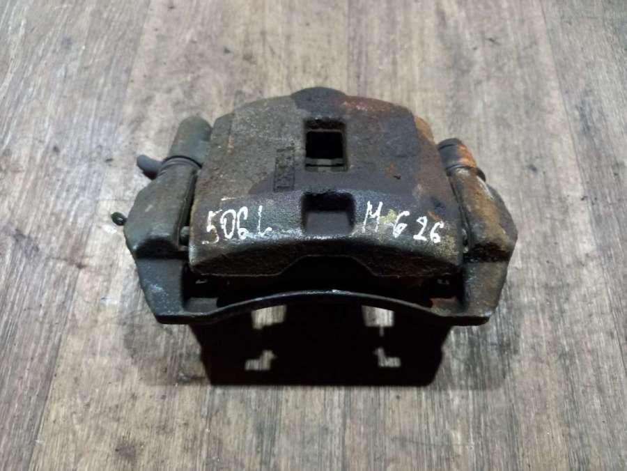 суппорт передний левый Mazda 626 GF 1998, 2.0 л., бензин, МКПП, универсал - фото №1