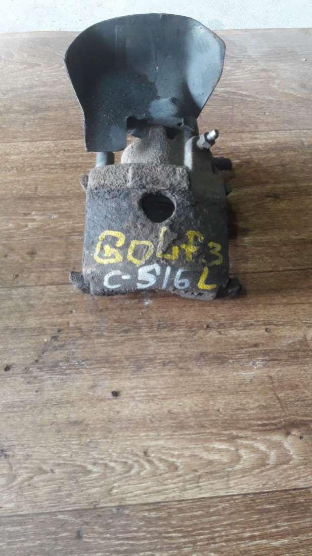 суппорт передний левый Volkswagen Golf 3 поколение 1996, 1.6 л., бензин, МКПП, хетчбэк 5 дв. - фото №1