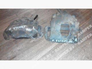 суппорт передний левый Ford Escort 4 поколение 1990