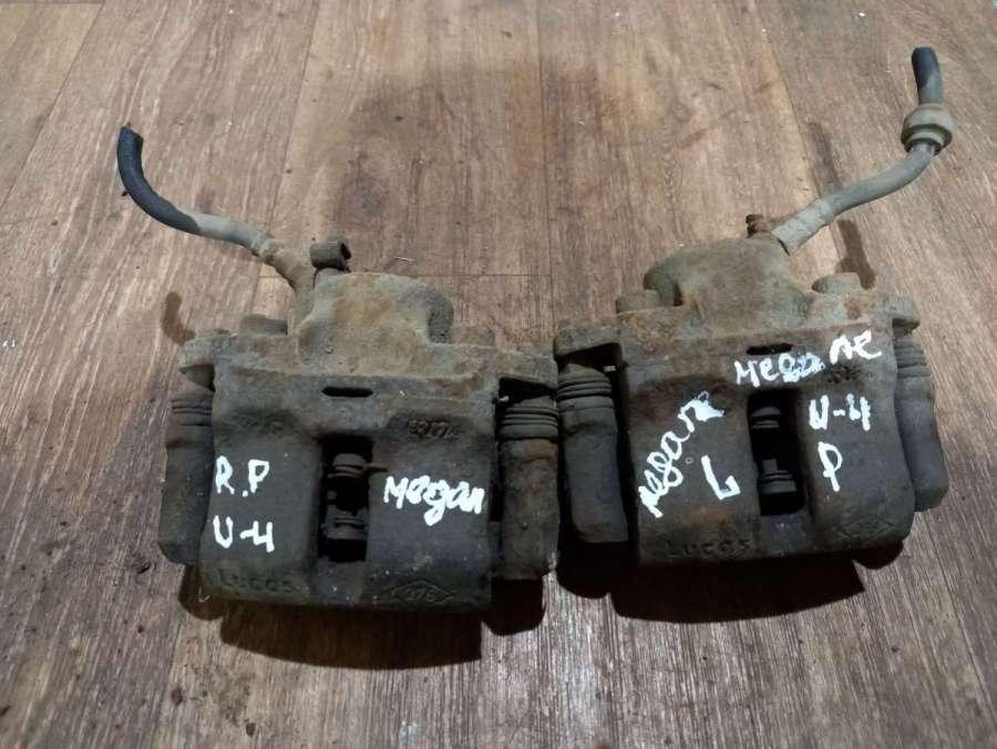 суппорт передний левый Renault Megane 1 поколение 1996, 1.9 л., дизель, МКПП, хетчбэк 5 дв. - фото №1