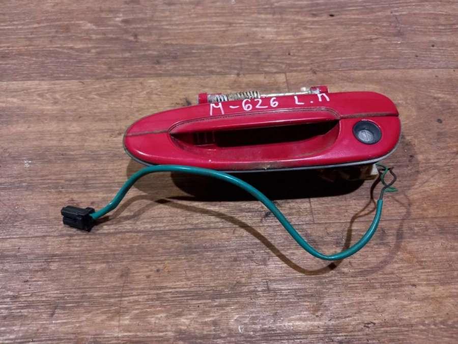 ручка наружная передняя левая Mazda 626 GF 1998, 1.8 л., бензин, МКПП, хетчбэк 5 дв. - фото №1