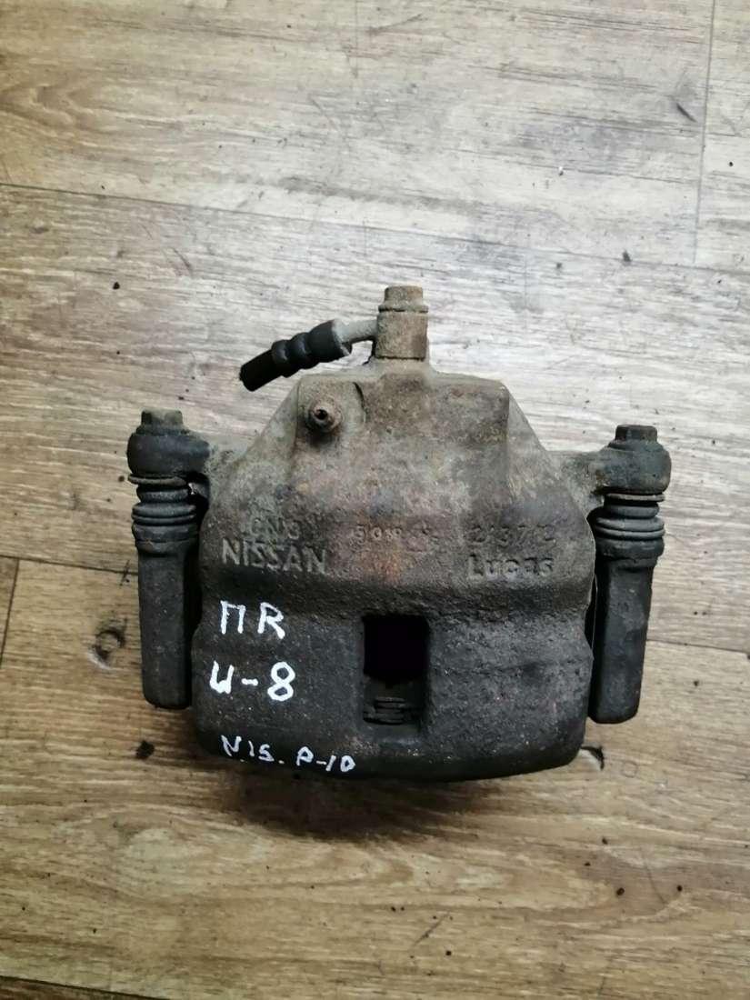 суппорт передний правый Nissan Primera P10 1995, 1.6 л., бензин, МКПП, седан - фото №1