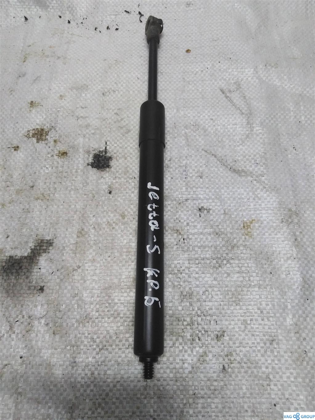 амортизатор крышки багажника (3-5 двери) Volkswagen Jetta 5 поколение 2008, 1.9 л., TDi, дизель, седан, 1K5827550C, . - фото №1