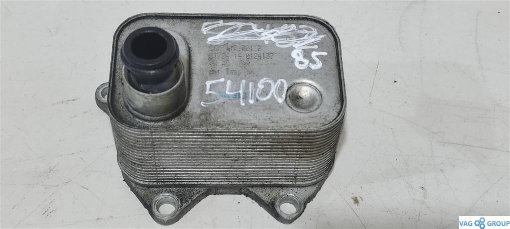 теплообменник масляного фильтра Volkswagen Jetta 6 поколение 2012, 1.8 л., TFSI, бензин, седан, 06K117021B, CXBA, CXBB, CPKA, CPRA, CPLA, CPPA, 06K117021C - фото №1