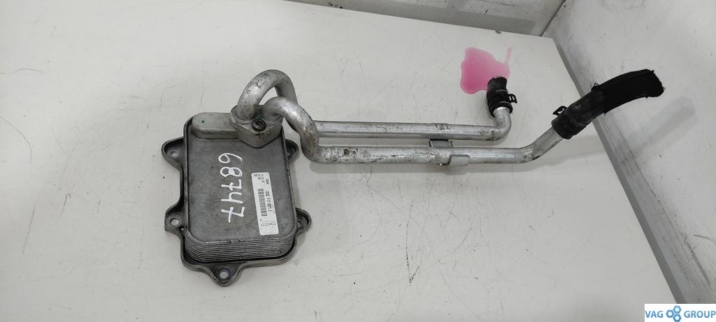 радиатор масляный Volkswagen Passat B6 2009, 1.4 л., бензин, седан - фото №1