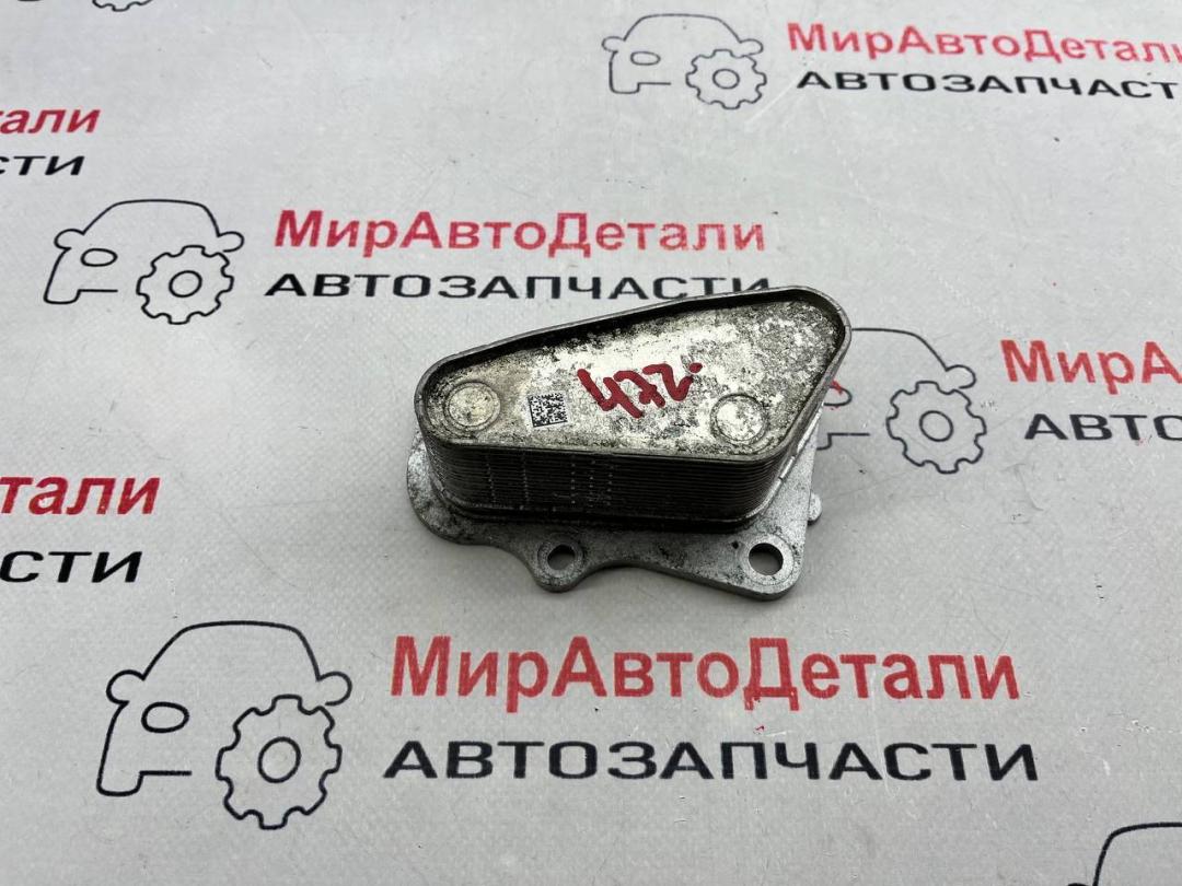теплообменник масляного фильтра Chevrolet Cruze 2 поколение (2015 - 2025), 1.4 л., бензин, 12678774 - фото №1