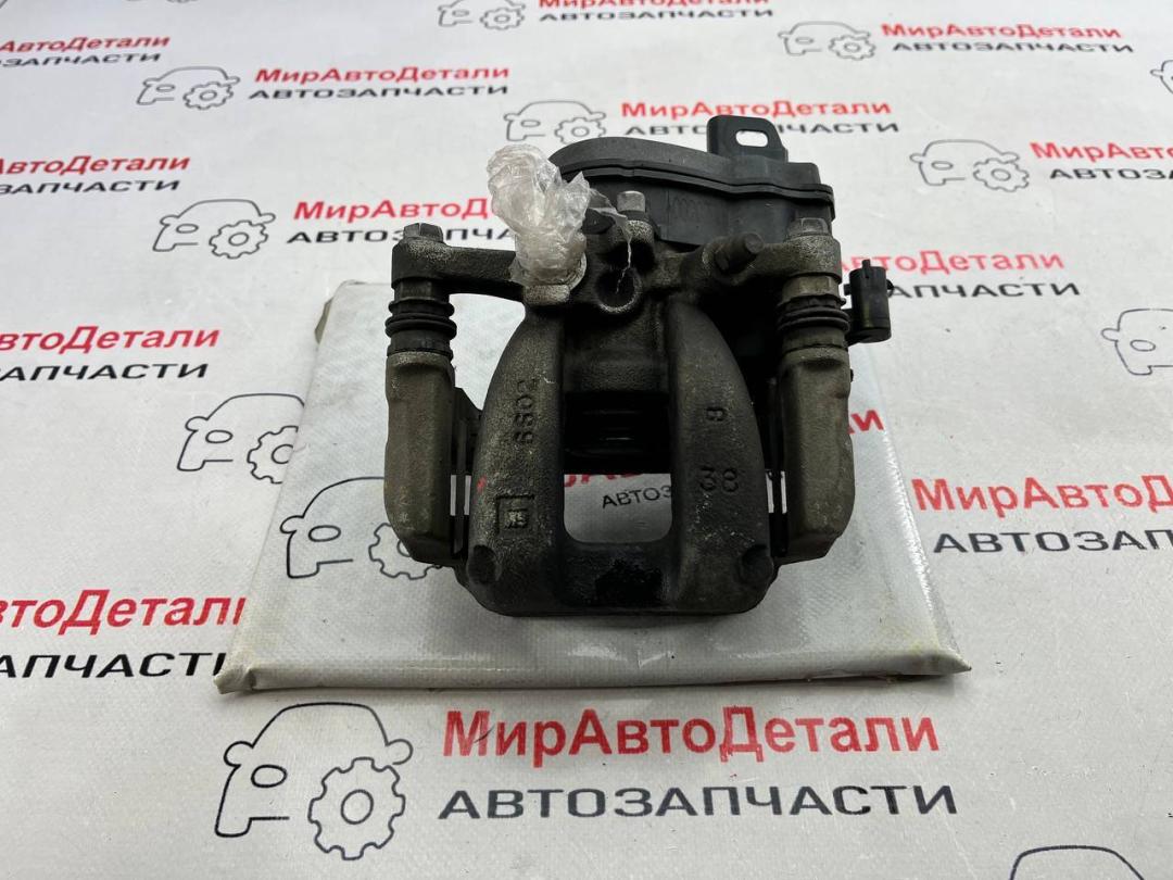 суппорт задний левый GMC Terrain 2 поколение 2019, 1.5 л., бензин, АКПП - фото №1