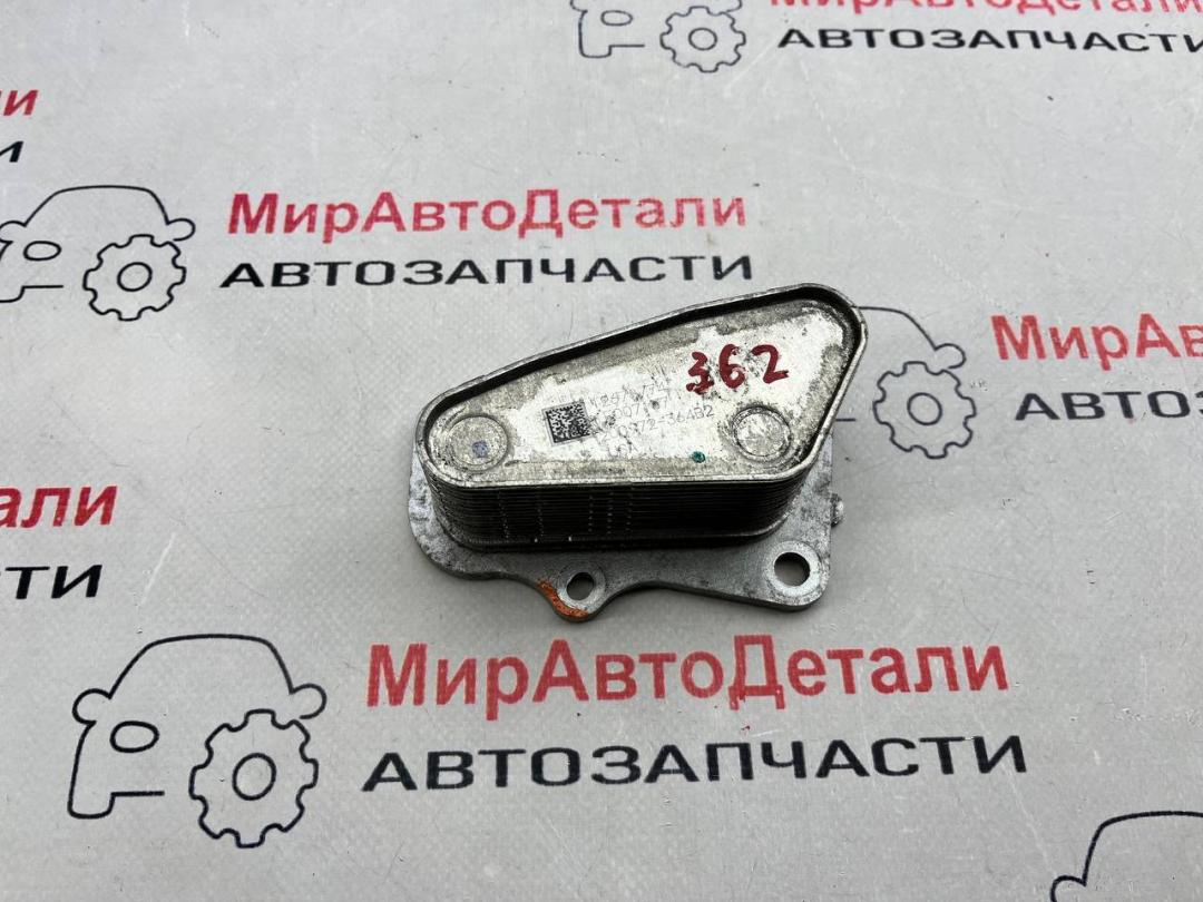 теплообменник масляного фильтра Chevrolet Cruze 2 поколение (2015 - 2025), 1.4 л., бензин, 12678774 - фото №1